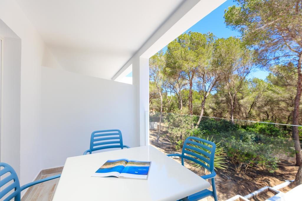 Pinos Playa Suites Playa Migjorn Bagian luar foto